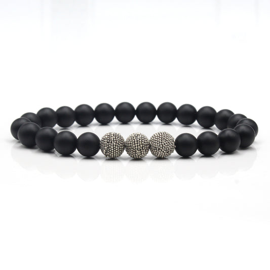 Mattschwarze Onyx- und Sterlingsilberperlen